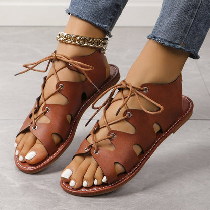 elveswallet Flat open toe criss cross straps hollow sandals