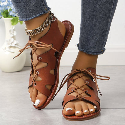 elveswallet Flat open toe criss cross straps hollow sandals