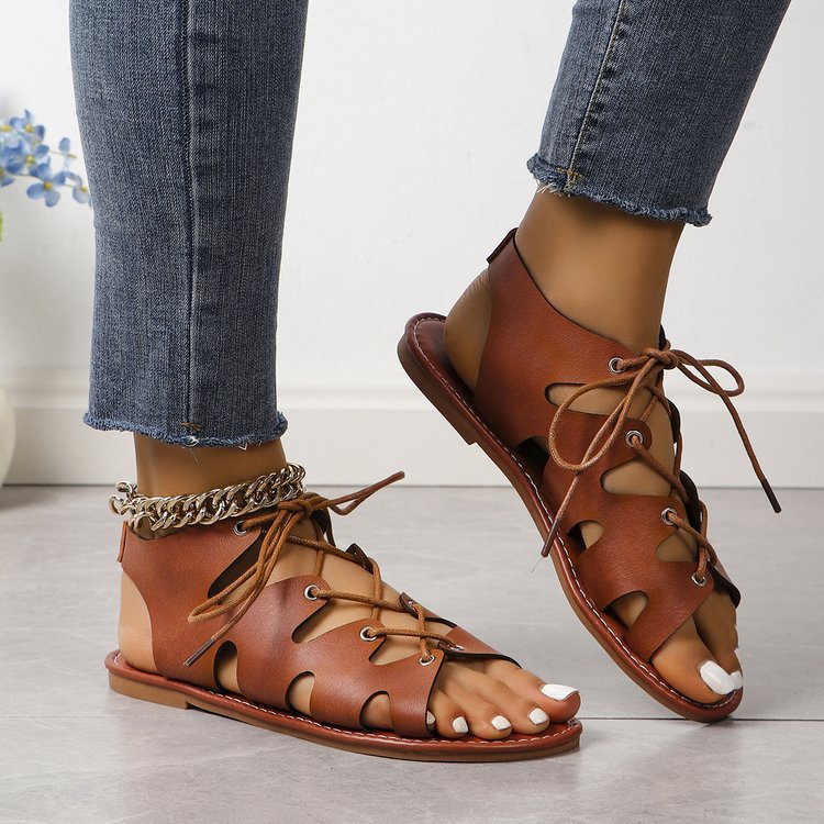 elveswallet Flat open toe criss cross straps hollow sandals